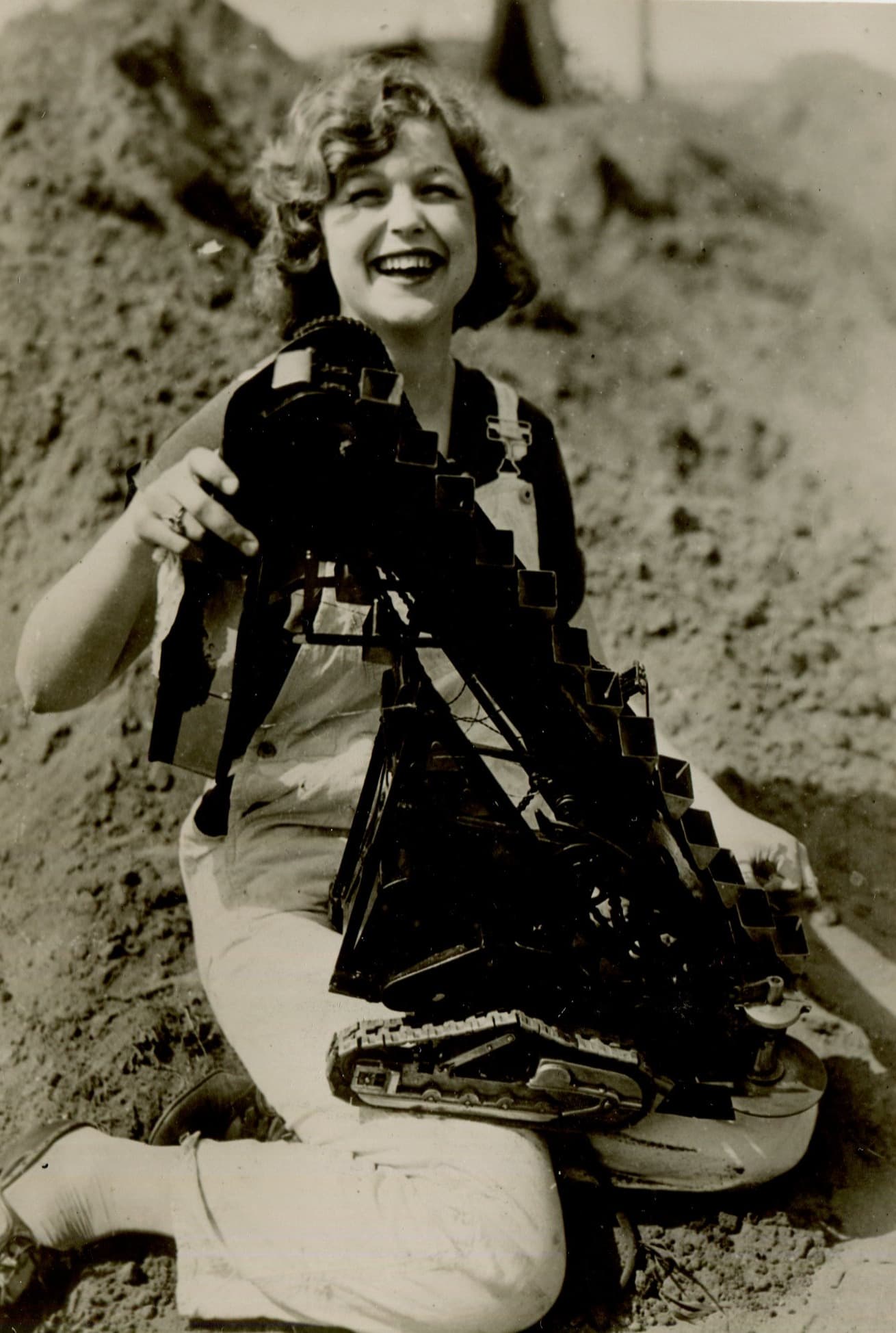Woman with Sand Digging Machine 1920